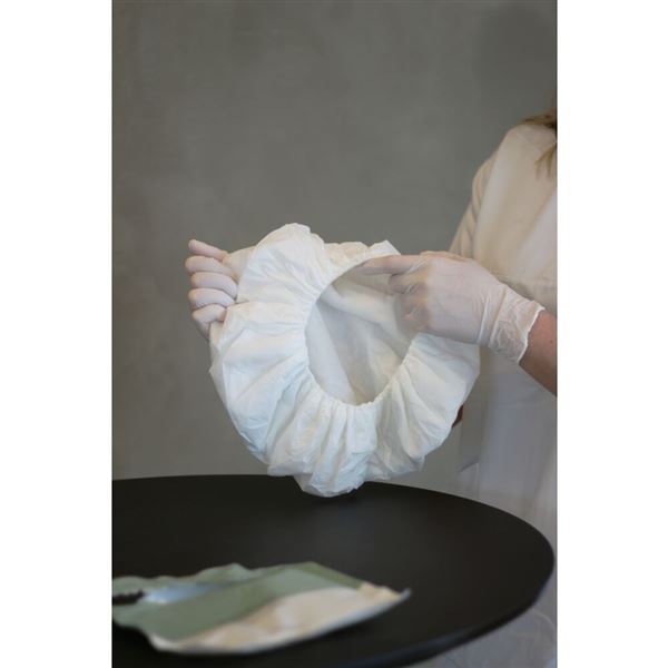 Abena mycí čepice se šamponem a kondicionerem