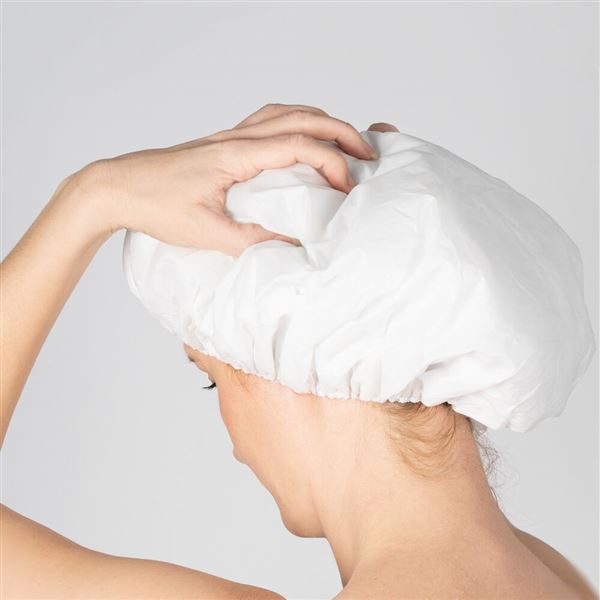 Abena mycí čepice se šamponem a kondicionerem